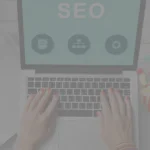 woman hands using SEO tools in her white color laptop